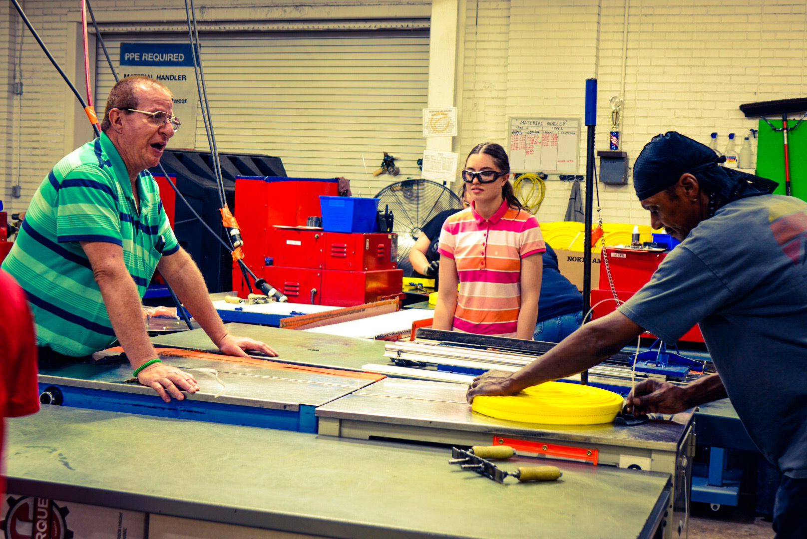 NewView employees are seen manufacturing yellow fire hoses for the US Forest Service.