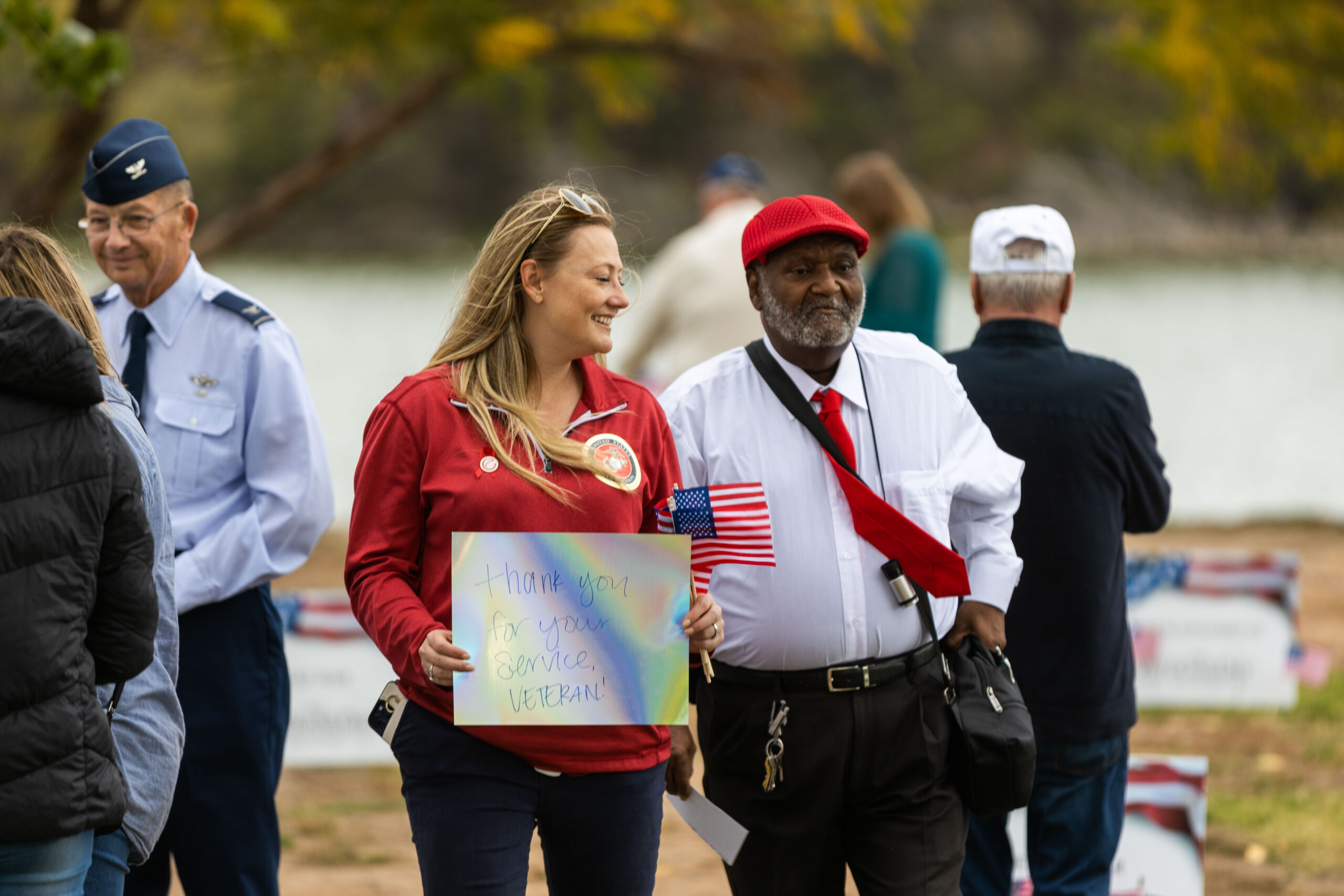 NewView VP Ashley Howard walks with a veteran who is blind