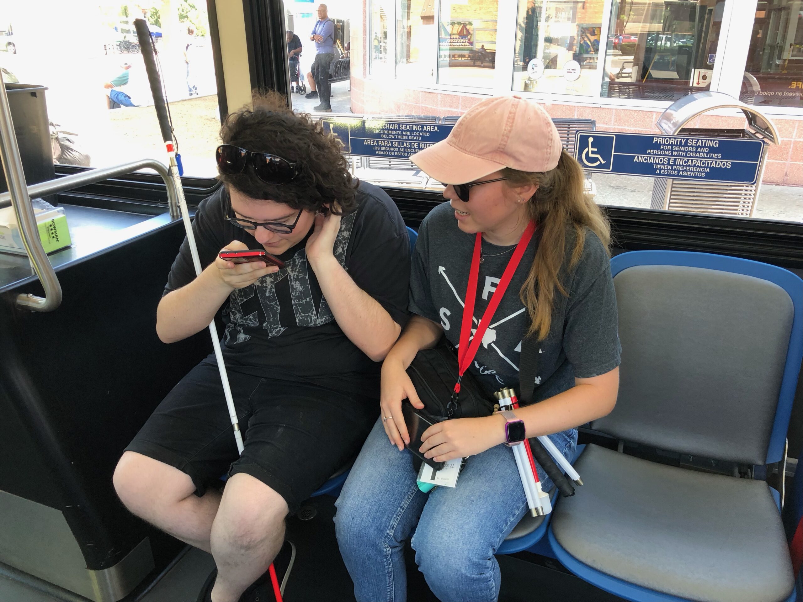 Someone who is blind getting an O&M lesson on public transit in Oklahoma City.