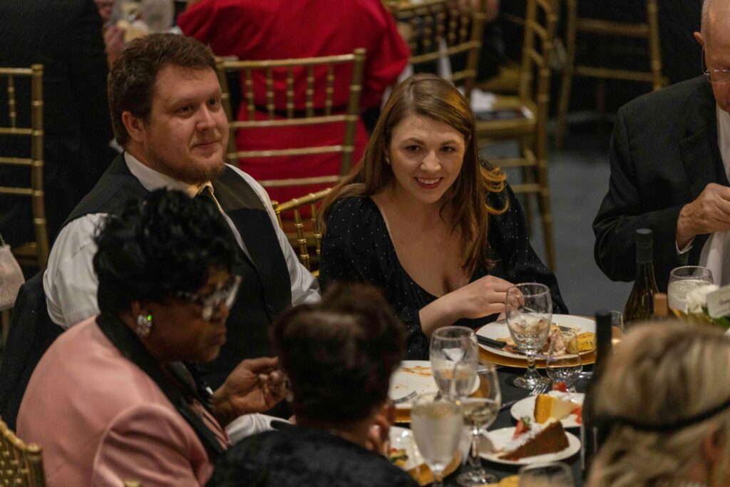 NewView donors are seen enjoying a lovely dinner at NewView Oklahoma's 75th Anniversary celebration.