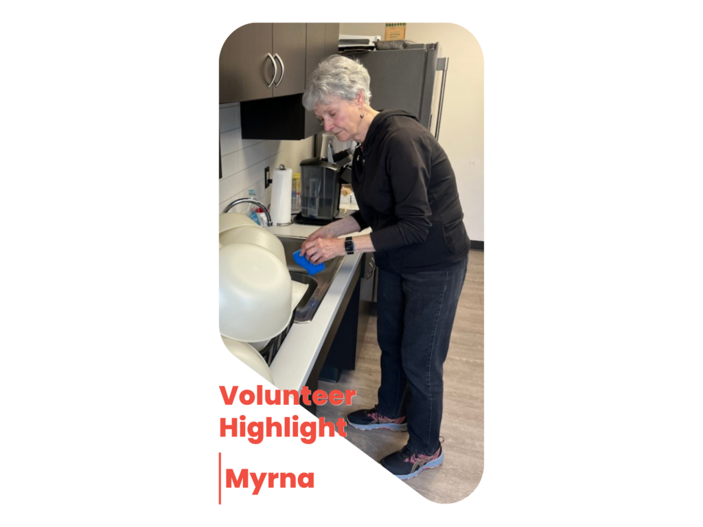 Myrna washing dishes in the NVO Classen Community Room Kitchen.
