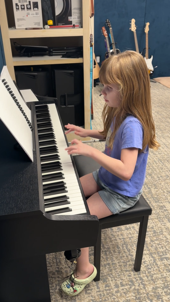 Amelia at the piano