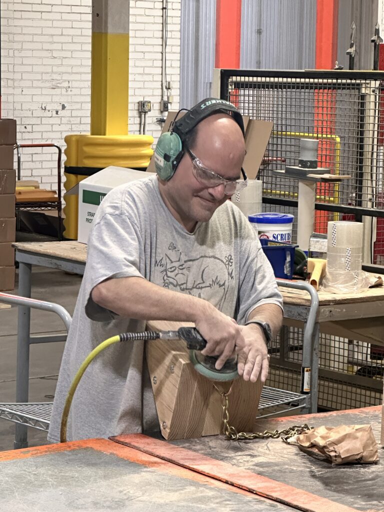 Sanding a block for the chocks.